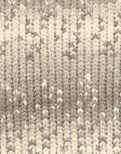 A close up of yarn knitted fabric.