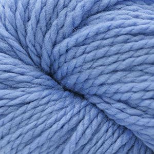A close up of a blue 128 Superwash Bulky 518 skein of yarn.
